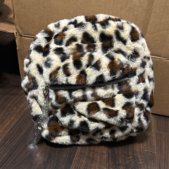 Gucci Handbags - Gilda Paris Leopard Print Faux Fur Mini Backpack